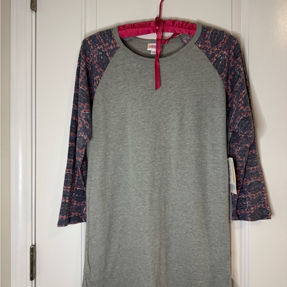NWT Lularoe Randy Shirt, Size Medium, Gray Print Sleeves 3/4 Length Sleeves.